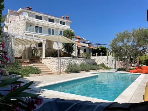 Villa Soliday in Okrug right by the sea