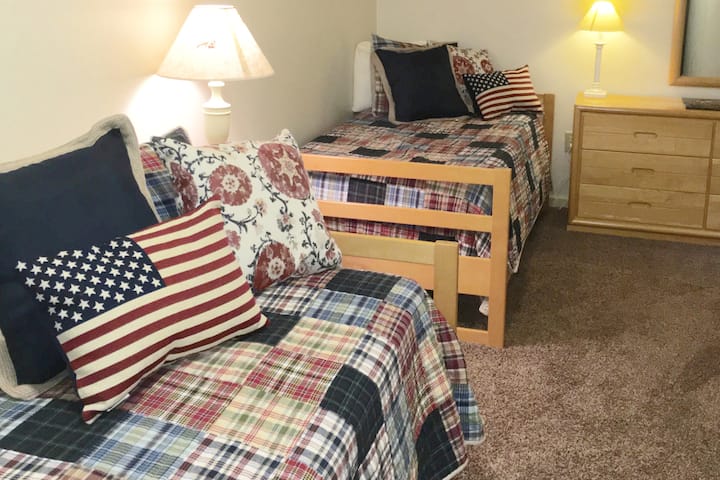 Third bedroom with two twin size bed.  These can be bunked for long term stays and we are working on installing a flat screen so kids have their own space. Small TV in this room-nice for kids and works with gaming (you need to bring system and cords)