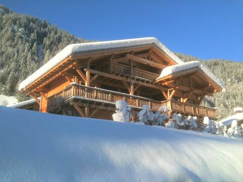 Savoyard-style mountain chalet, ski-in/ski-out view