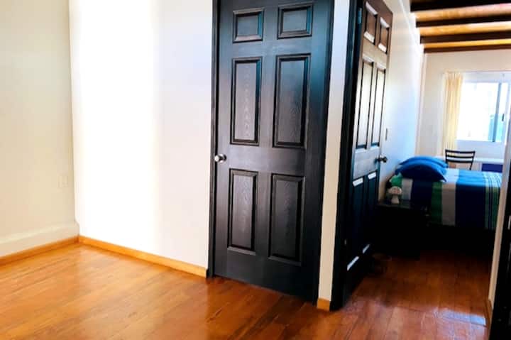 Access from Bedroom 3 on the Upper Floor.