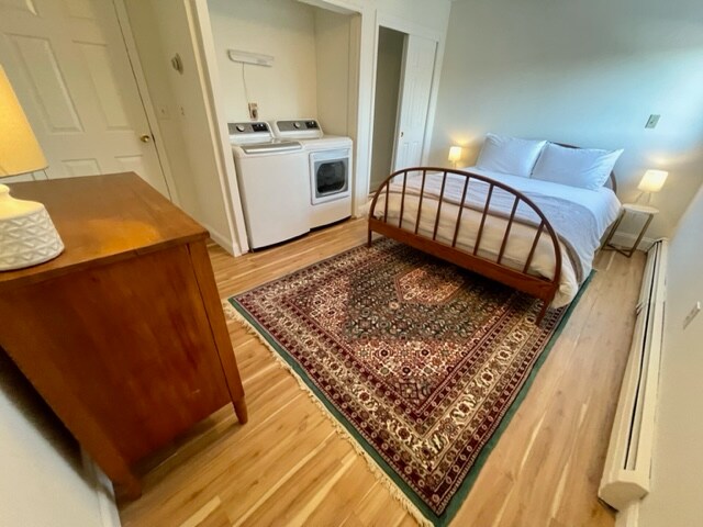 卧室配有1张标准双人床、洗衣机和烘干机。 