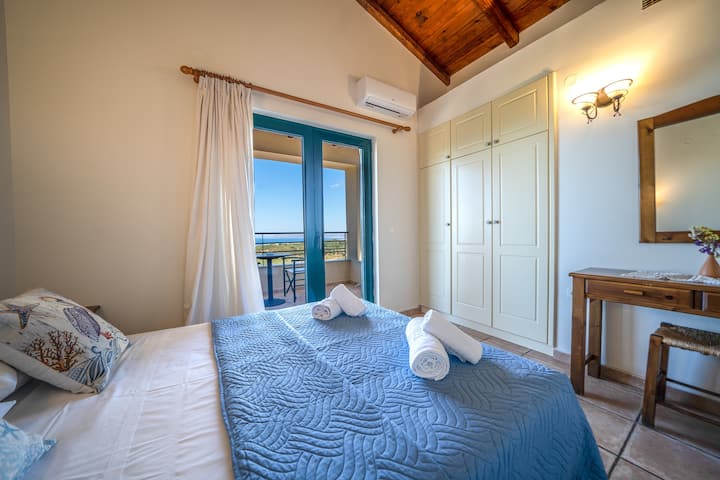 Bedroom 1 with queen bed and ensuite bathroom