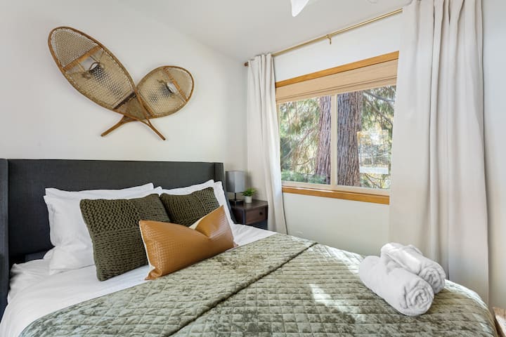 Bedroom 1 - enjoy the view of the giant sequoia tree right out the window! Blackout curtains and Roman shades for privacy.