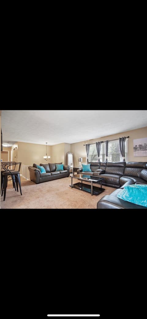 Cheerful 4 bedroom home with parking on premises.
