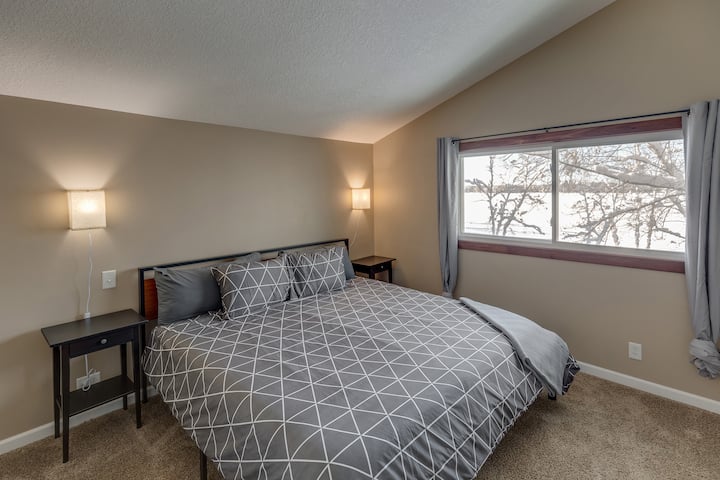 Upper bedroom with king bed.