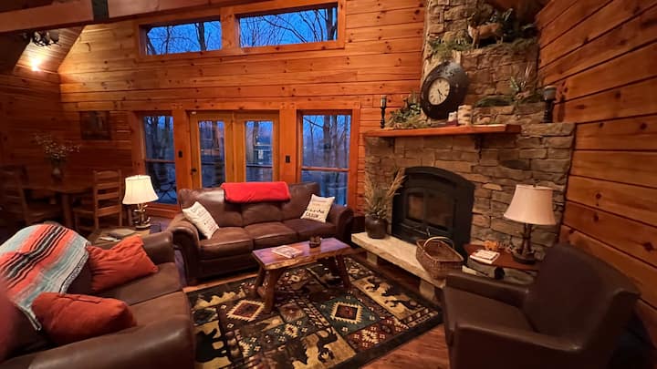 Nice, cozy living room with wood-burning fireplace.