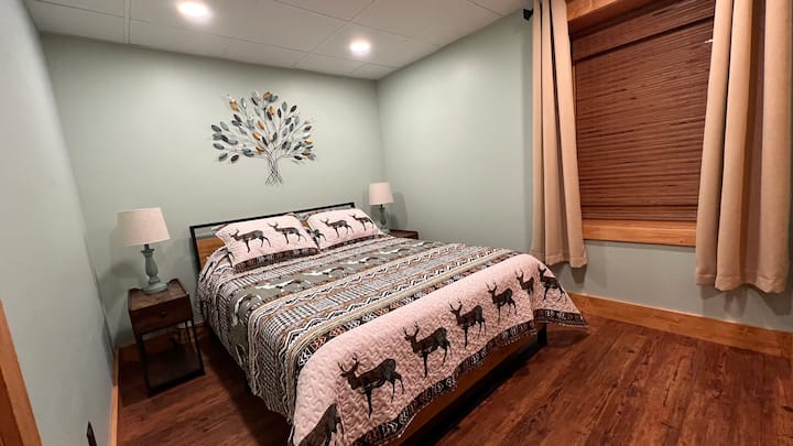 Queen bedroom in basement.