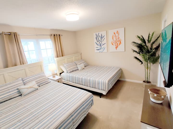 Two queen beds in the family suite