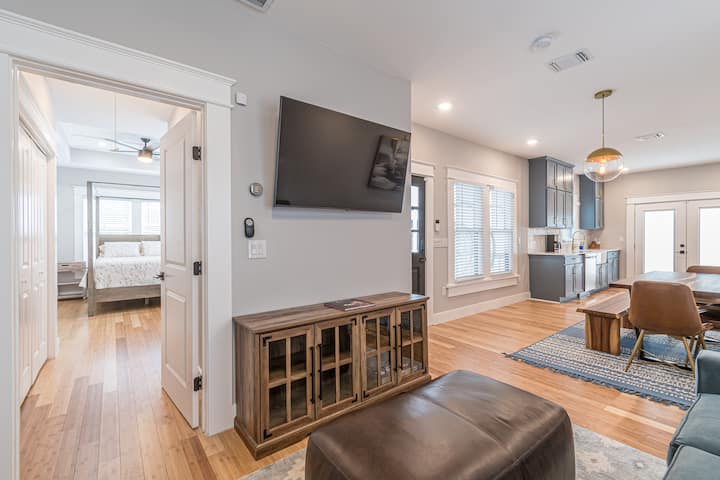 Chic style meets comfort with bright windows and modern furnishings in the second living room!