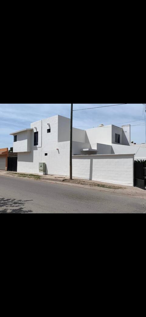Very good house, corner location with two garages