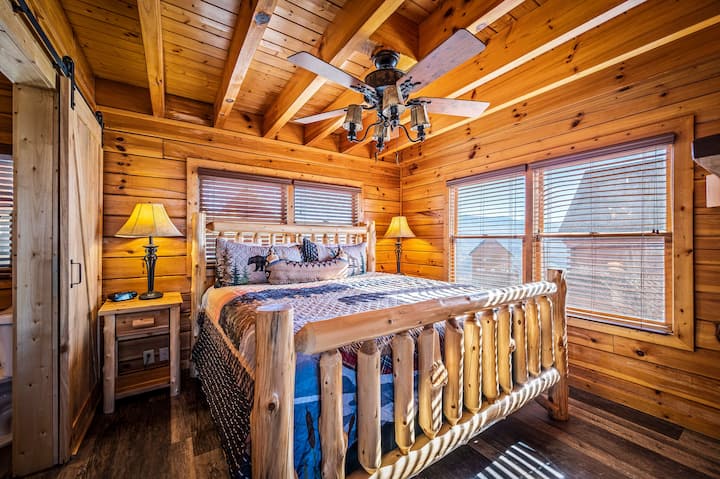 Master bedroom (king) includes a dresser for storage, smart TV, and attached full bathroom.