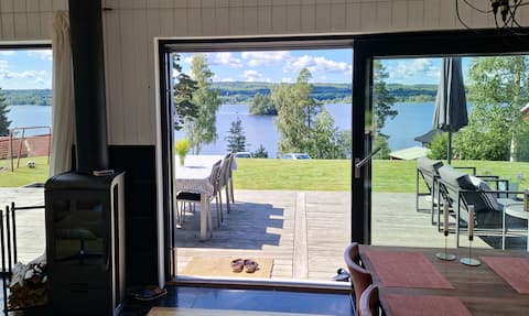 Modern holiday cottage with lake view