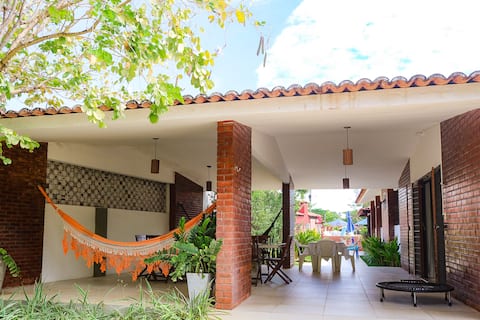 Cheerful Beach house 5 bedroom with common pool