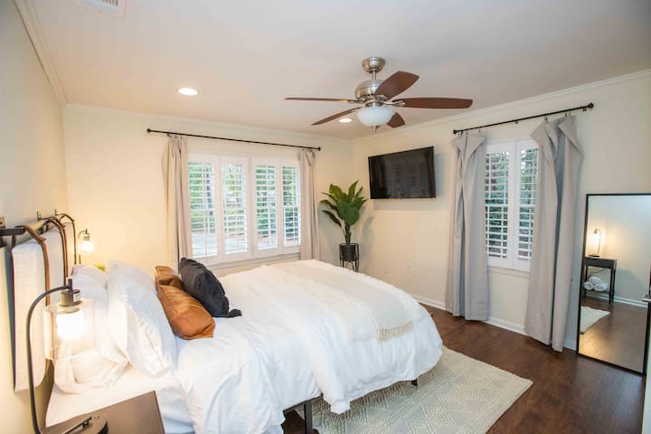 Bedroom 4 features a comfortable Queen size bed, quality pillows and linens, 55" Roku TV, plantation shutters, remote ceiling fan, full length mirror.  Night stands have USB.  Bathroom 3 is located right outside of bedroom.