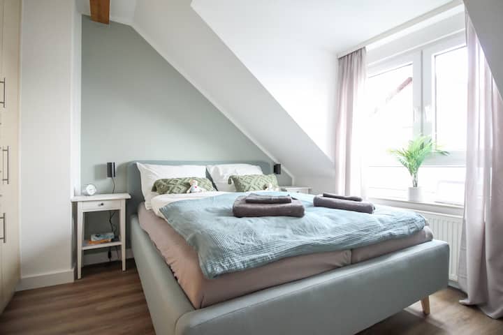 Notre lit queen-size confortable qui vous amènera à un sommeil réparateur.