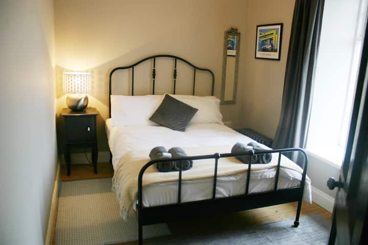 Double bed in Bedroom 4, at the front of the house.