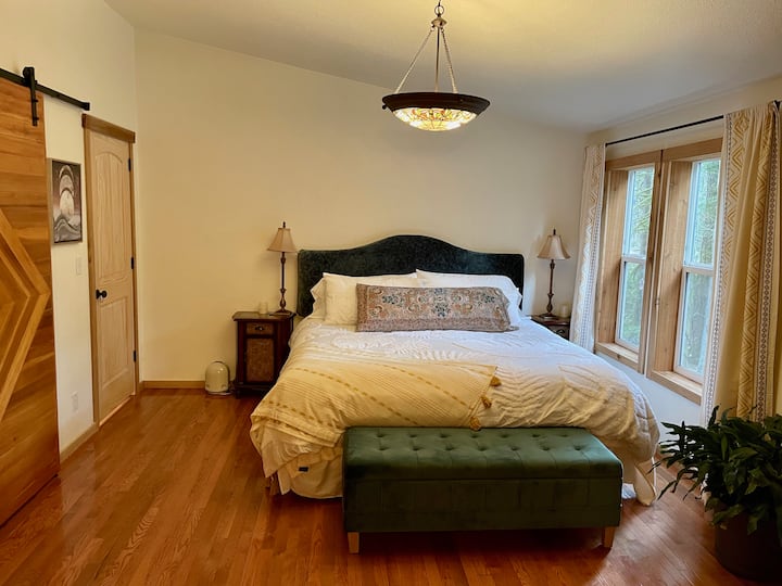 King Bedroom with private bathroom and shower.