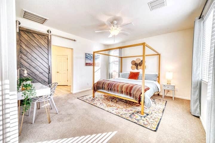 Main bedroom located in the back of the house with a king sized pillow top mattress and private work space.