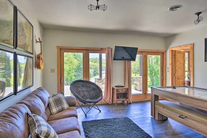 Lower level offers a game room with an air hockey/ping pong table. Sleeper sofa for additional sleeping space.