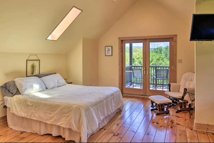 Master bedroom is a loft with a private balcony. There are 2 queen beds in the loft with an ensuite bathroom.