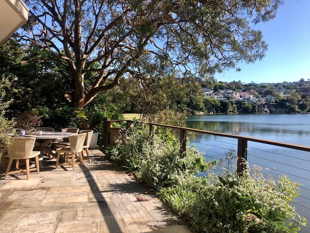 Stunning designer harbour beachfront home