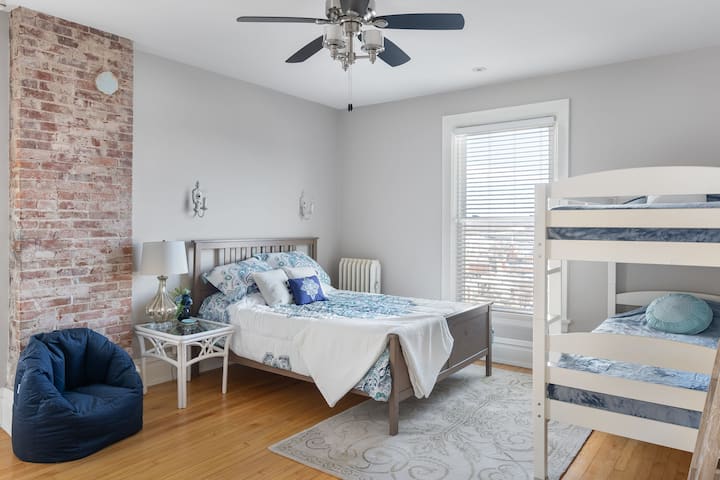 Bedroom #2 (of 4) includes a queen bed and a twin bunk bed.