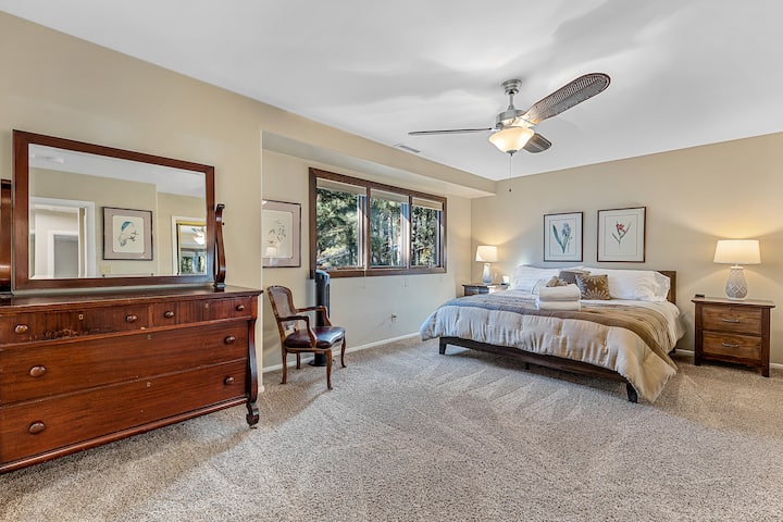 Upstairs bedroom  with a king bed and private bathroom.