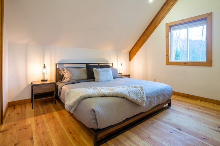 Master bedroom featuring a comfortable king size bed