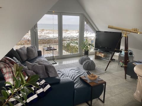Beachfront house with fireplace, upper floor