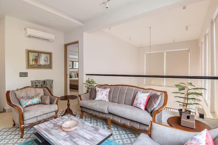 Elegantly appointed living room with classical touches that create a cozy ambiance.