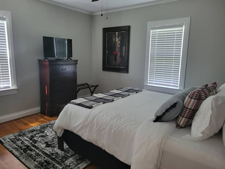 Back bedroom with new queen memory foam mattress and smart TV