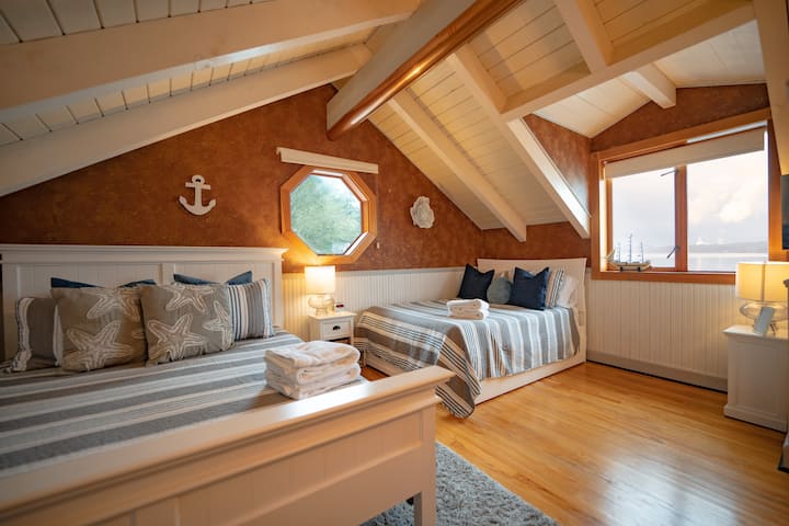 The Blue Bedroom, 1 Queen Bed (left) One Full (right) and a twin trundle (under the full)

Located upstairs