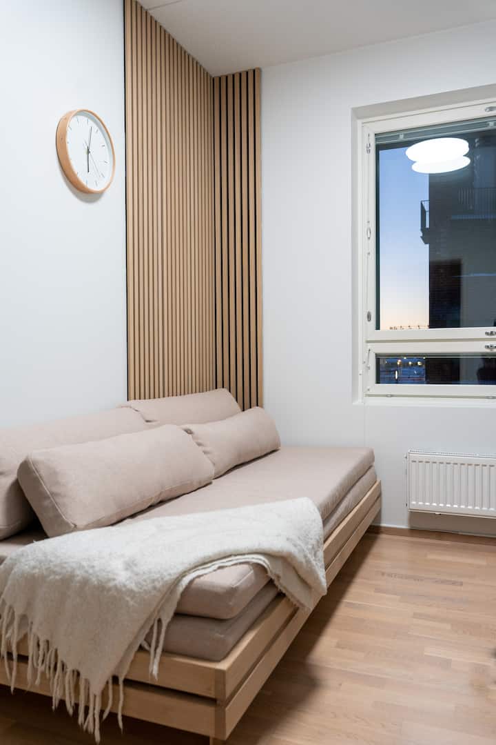 The second bedroom has designer Tapio Anttila's Day&Night sofabed that can be used as a double bed (160cm) or two separate single beds (80cm) or in a single bed configuration if more floor space is required or as a sofa like in the photo.