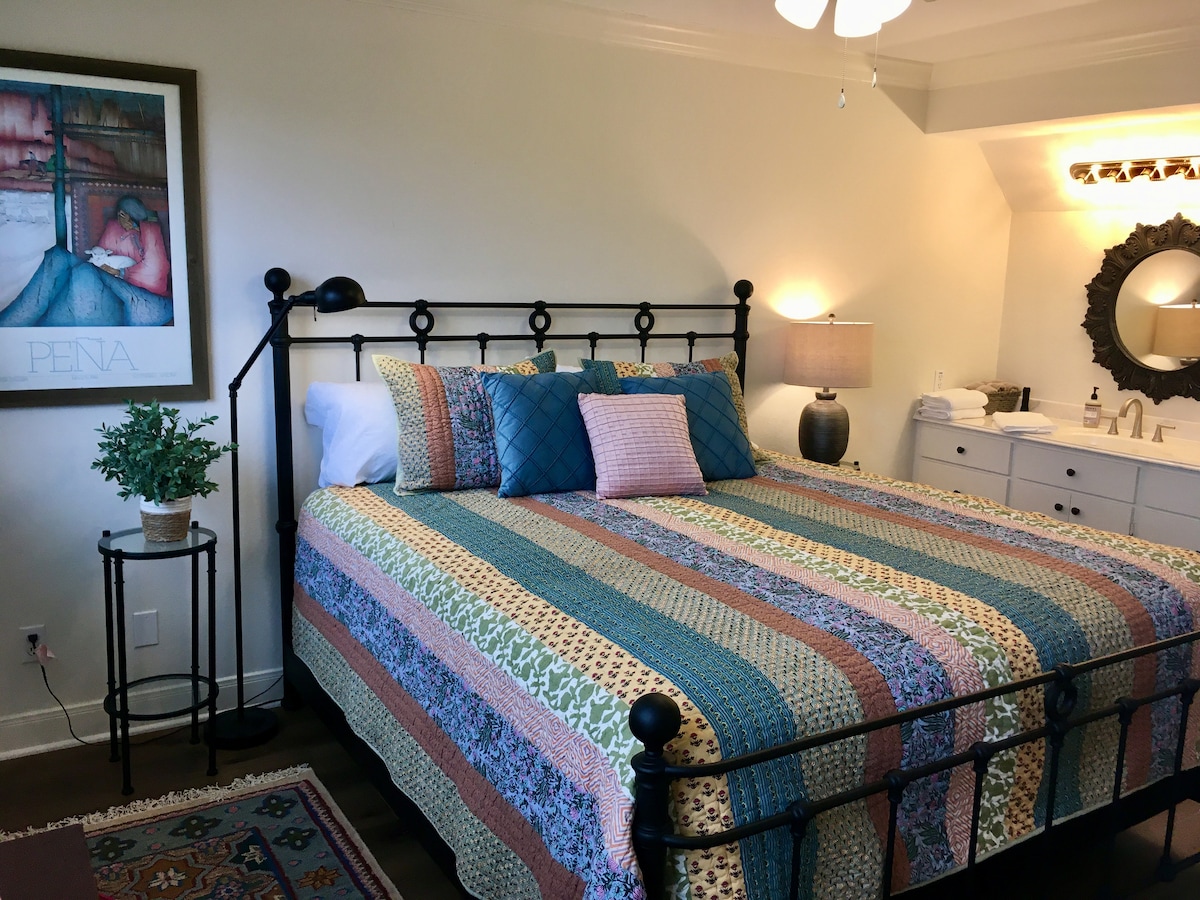 upstairs primary bedroom with en-suite full bathroom (not pictured: washer and dryer in closet)