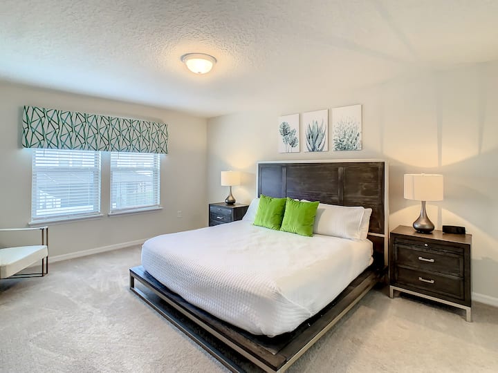 Enjoy this king-sized bedroom for a comfortable and restful stay.