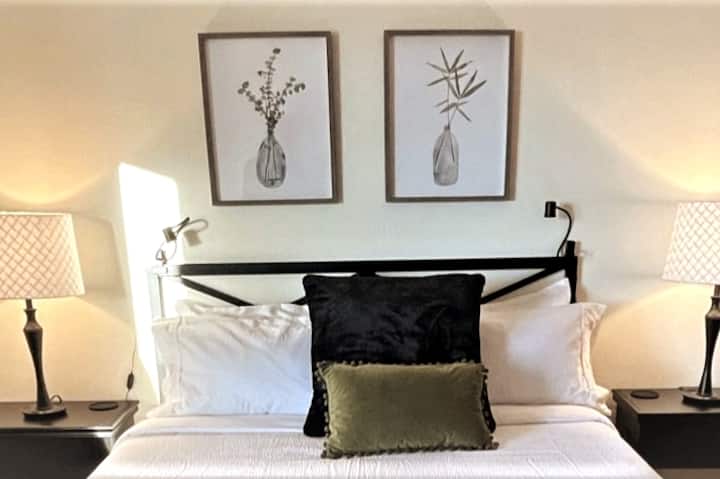 Queen bedroom (1 of 2) with 12" Green Tea memory foam mattress, deluxe cotton triple sheet bedding, ample closet space
