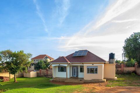 Bright house with big garden in private compound