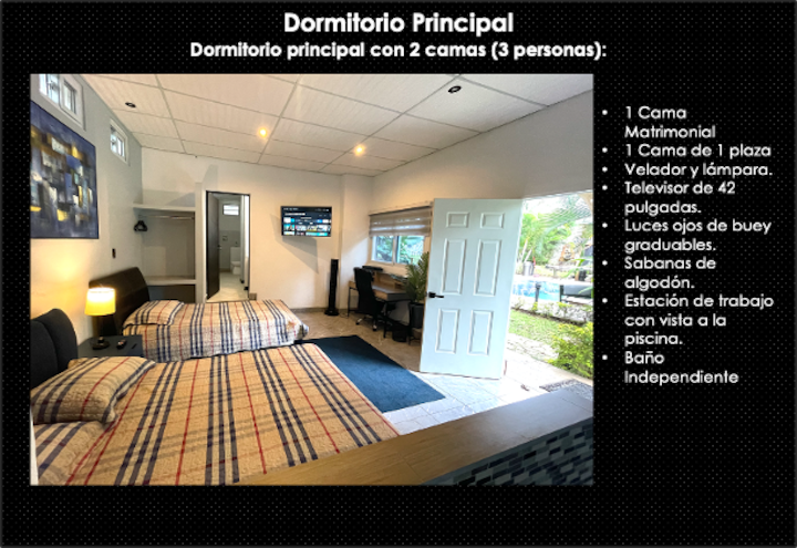 Hauptschlafzimmer mit Doppelbett und 1-Sitzer-Matratzenbett mit Kerzen und Lampe und abziehbarem Porthollichtern. Baumwollbettwäsche. Arbeitsplatz mit Blick auf den Pool. 42-Zoll-Fernseher. Separates Badezimmer.
