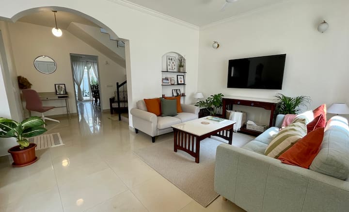 Living Room with 55 inch TV which comes with Firestick and all the major OTT subscriptions.