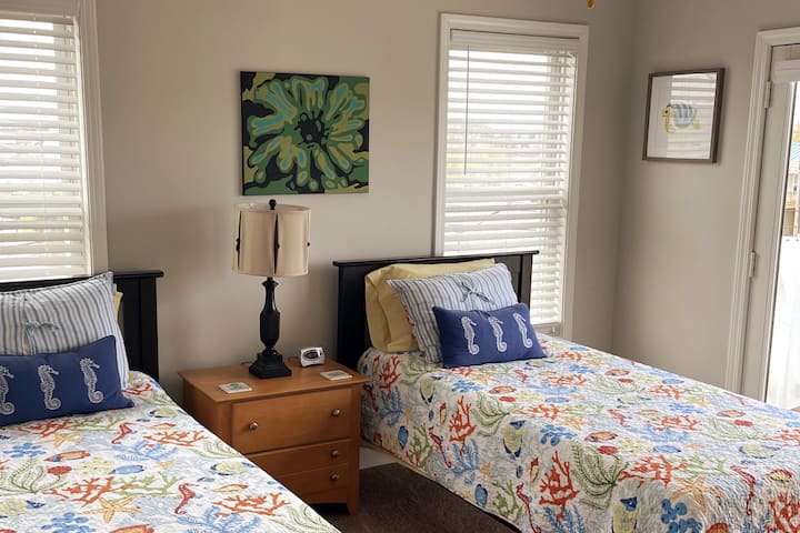 3rd floor back bedroom with a private balcony to recharge your energy in the evening.