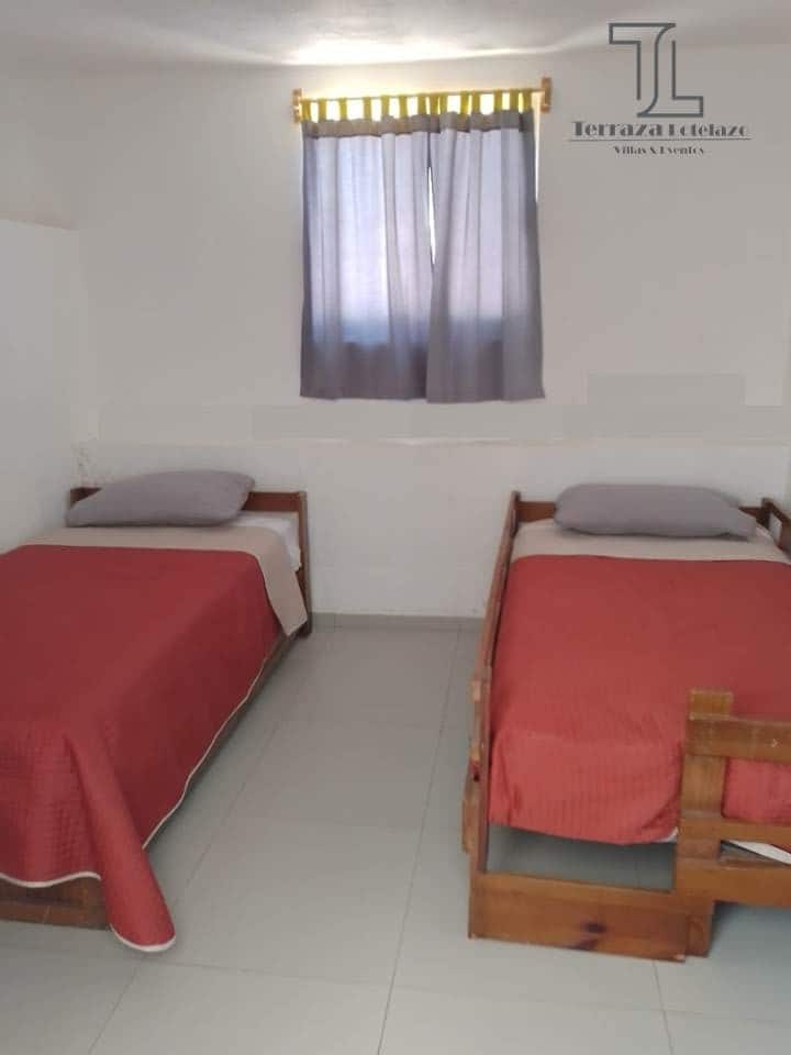 Chambre avec lits simples dans villa de 4 chambres