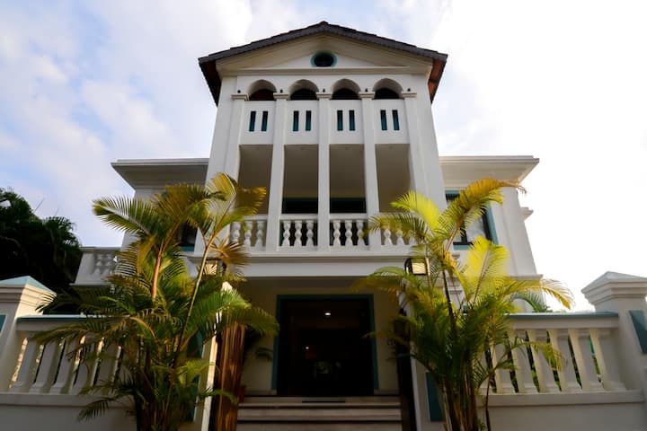 Presenting Casa Feliz- a contemporary mix of vintage portugese architecture and modern amenities with a roof top swimming pool . Fully air conditioned with plenty of open spaces and surrounded by lush green hills and beautiful trees and plants.