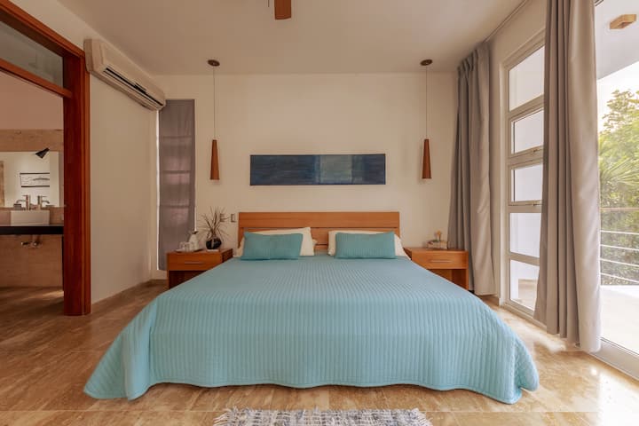 Master bedroom with its own spacious private bathroom