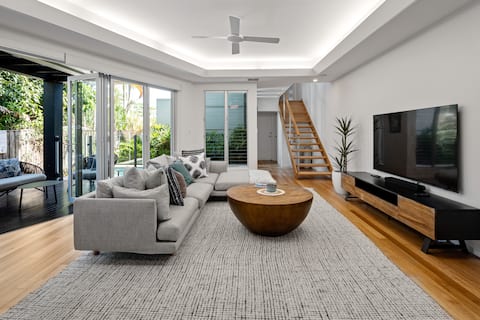 Modern, airy duplex steps to River, heated pool