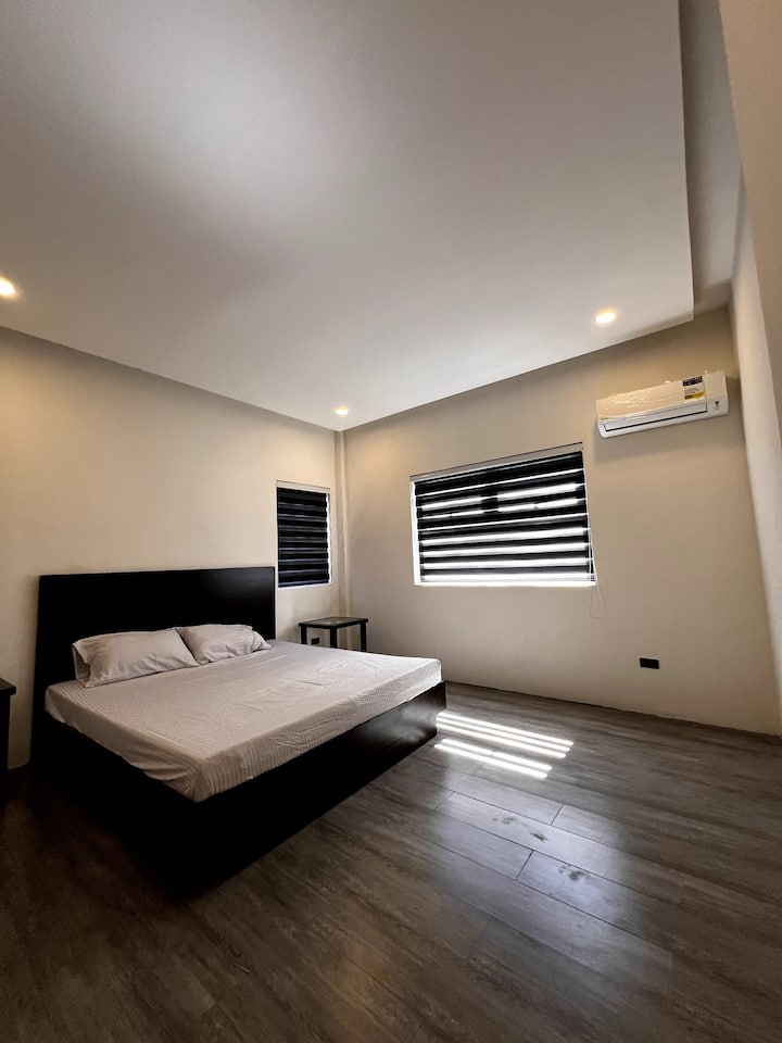 King size bed for the family. A couple with kids can fit comfortably. We also offer floor mattresses for any additional guests. 