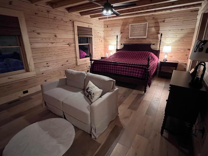 Main Bedroom with King size bed and love seat