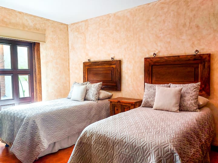 Room 3. 2 imperial beds, level 1, private bathroom.  tv