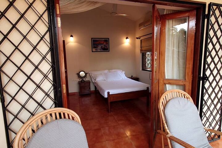 First floor bedroom from balcony