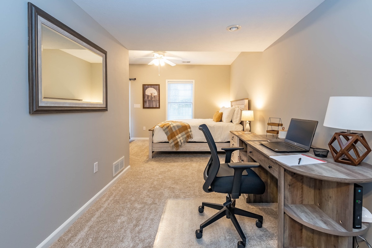 The basement provides an all inclusive suite with a queen size bed, desk, queen size sleeper sofa, love seat 55" smart TV and full bath.  My first apartment didn't offer this much!