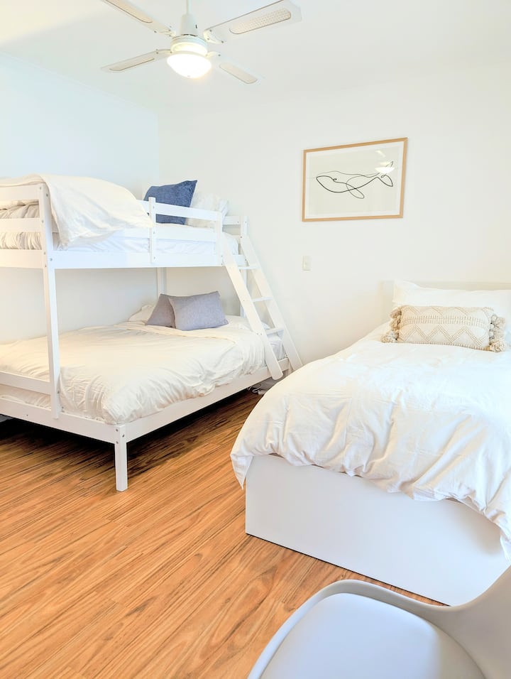 The Perfect Family Getaway: Enjoy Our Kids Room with Bunks

Bedroom 3: Bunk Bed with Single Over Double, and Single Bed with Built In Wardrobe Perfect for Kids